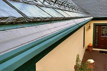 Full gutters in Burlington MA, but we have a solution